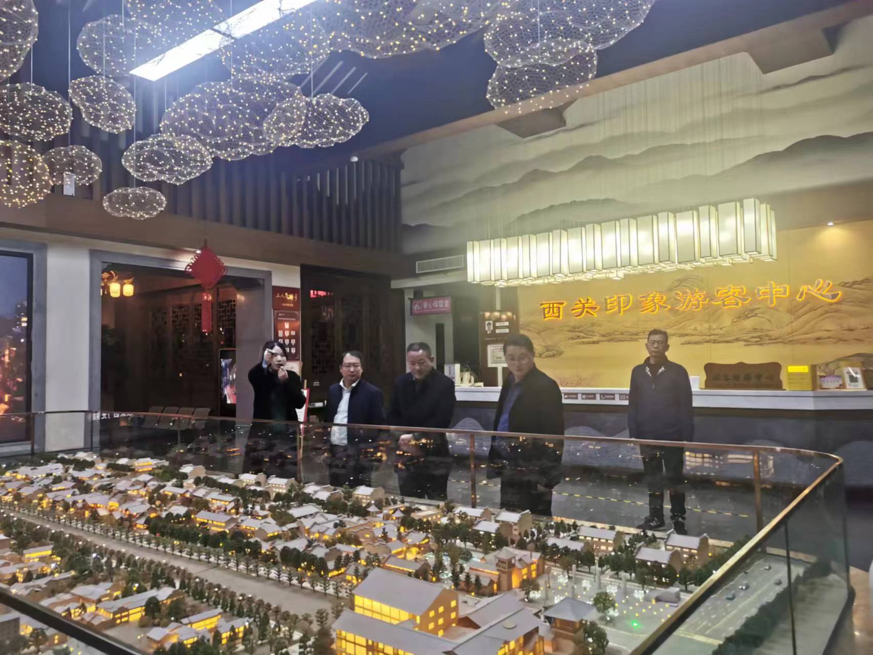 御业团队陪同西乡县政府领导考察房县西关印象